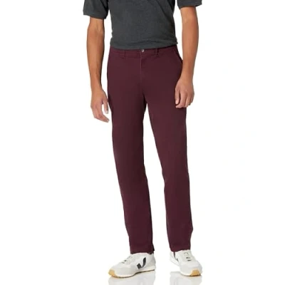 Abbildung von Amazon Essentials Herren Legere Stretch Chinohose in sportlicher Passform (in Übergröße erhältlich), Burgunderrot, 36W / 34L