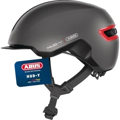 Abbildung von ABUS Urban Helm HUD Y mit magnetischem, aufladbarem LED Rücklicht &amp; Magnetverschluss cooler Fahrradhelm für den Alltag Damen und Herren Titan/Rot Matt, Größe M
