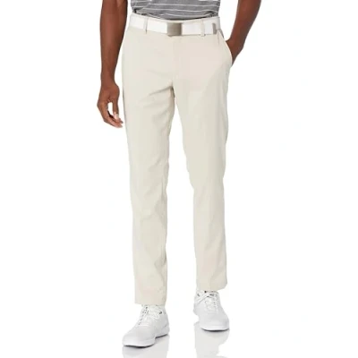 Abbildung von Amazon Essentials Herren Golf Stretchhose, Schmale Passform, Stone, 30W / 28L