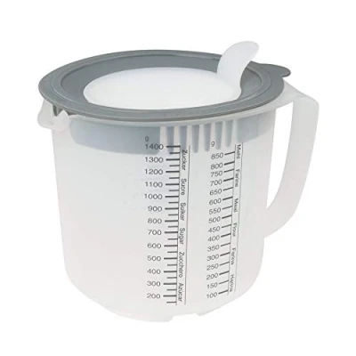 Abbildung von Dr. Oetker Mess und Rührbecher 1,4 L, Unterschiedlichen Messskalen, mit Spritzschutz, Becher aus hochwertigem Kunsstoff (Farbe: Orange/Transparent) spülmaschinengeeignet, Menge: 1 Stück
