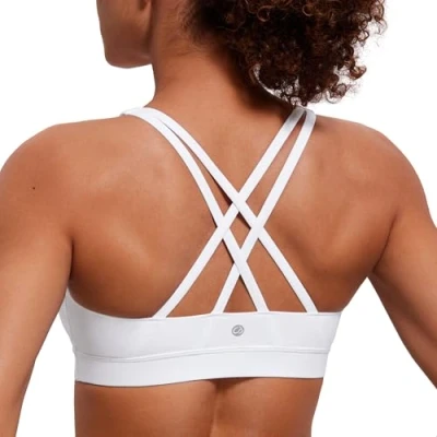 Abbildung von CRZ Yoga Damen Ohne Bügel Sport BH Gekreuzt Rücken Spaghetti Top Abnehmbare Pads Croptop Weiss Logo L