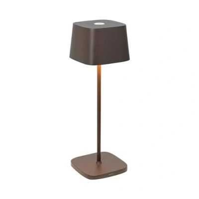 Abbildung von Zafferano, Ofelia Lampe, Kabellose, Wiederaufladbare Tischlampe mit Touch Control, Auch für den Außenbereich Geeignet, Dimmer, 2200 3000 K, Höhe 29 cm, Farbe Corten