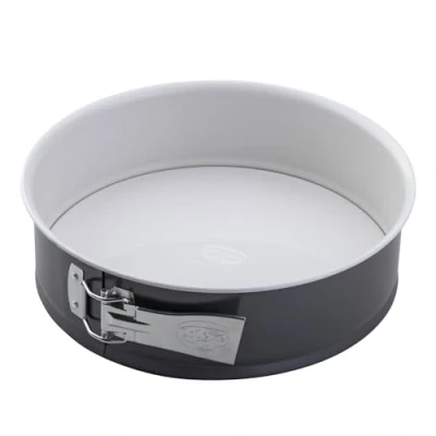 Abbildung von Dr. Oetker Springform Ø 26 cm EXCLUSIVE, Backform mit schnitt &amp; kratzfestem Flachboden Emaille Versiegelung, runde Kuchenform Ring aus Stahlblech (Farbe: Grau Braun/Crème)