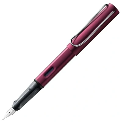 Abbildung von Lamy AL star black purple Füller Füllhalter mit ergonomischem Griff &amp; polierter Stahlfeder in Strichbreite B leichtes Aluminiumgehäuse inkl. Tintenpatrone T 10 blau Rechtshänder