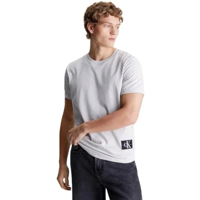 Abbildung von Calvin Klein Jeans Herren T Shirt Kurzarm Badge Turn Up Sleeve Rundhalsausschnitt, Grau (Lunar Rock), XXS