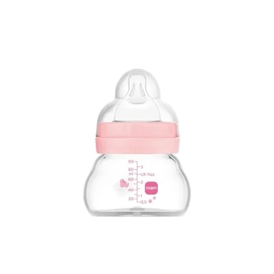 Abbildung von MAM Feel Good A157 Trinkflasche aus Glas, mit patentiertem SkinSoftTM Silikon Sauger 0, besonders weich, für Babys ab 0 Monaten, 90 ml, Rosa