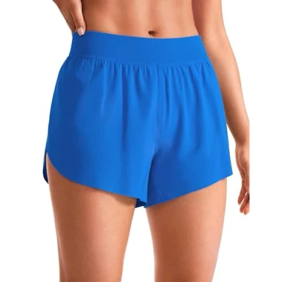 Abbildung von CRZ YOGA Damen Mid Waist Running Shorts Seitliche Splits Sport Workout Kurze Hose Leichte Atmungsaktive Sporthose Laufhose Funkelndes Blau 42