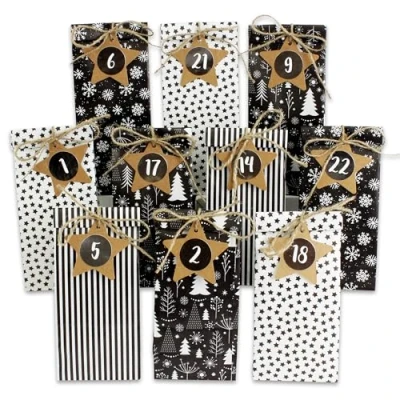 Abbildung von Papierdrachen Adventskalender zum Befüllen 24 bedruckte Geschenktüten und Zahlenaufkleber Klammern Motiv Schwarz Weiß Basteln Verschenken Weihnachten