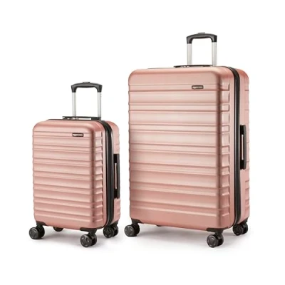 Abbildung von Amazon Basics Hartschalen Koffer Set, 2 Stück Erweiterbares Gepäck Set (55, 78 cm), Kratzfeste ABS Schale, 4 Rollen, Roségold