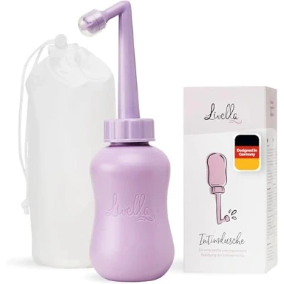 Abbildung von Livella Intimdusche in Lila (400 ml) Entwickelt Deutschland Für eine sanfte und hygienische Reinigung des Intimbereichs Mehr Wohlbefinden im Wochenbett Ideal als Reisebidet Podusche