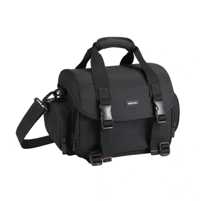 Abbildung von Amazon Basics Schultertasche für SLR Kamera und Zubehör, Groß, Verstellbarer Gurt, Wasserdicht, Stoßfest, Einfarbig, Gepolstert Schwarz/Orange