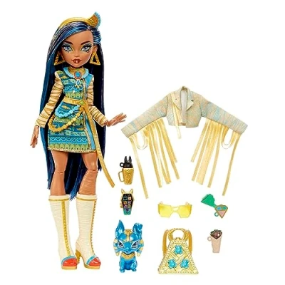 Abbildung von Monster High Cleo de Nile Puppe, Mummie Modepuppe, Königliches Outfit, Killerstiefel, Pyramidenrucksack, Zubehör, für Kinder ab 4 Jahren, HHK54