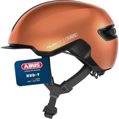 Abbildung von ABUS Urban Helm HUD Y mit magnetischem, aufladbarem LED Rücklicht &amp; Magnetverschluss cooler Fahrradhelm für den Alltag Damen und Herren Orange, Größe M