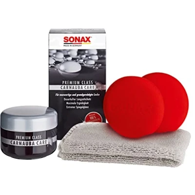 Abbildung von SONAX PREMIUM CLASS Carnauba Care (200 ml) 100% Carnaubawachs für alle neuen &amp; grundgereinigten Lacke inkl. 2x Schwamm 1x MicrofaserTuch Art Nr. 02112000