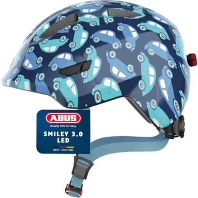 Abbildung von ABUS Kinderhelm Smiley 3.0 LED Fahrradhelm mit Licht tiefe Passform &amp; Platz für einen Zopf Mädchen und Jungs Blau Auto Muster, Größe S