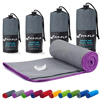 Abbildung von Fit Flip Mikrofaser Handtuch kompakt, leicht und schnelltrocknend Microfaser Handtücher als Reisehandtuch, Sporthandtuch, Strandtuch Badetuch groß (50x110cm, Grau mit Lila Rand)