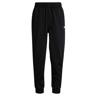Abbildung von JAKO Trainingshose Kinder Classico Schwarz Gr. 128 I Klassische Sporthose Jungen &amp; für Mädchen Mit Reißverschluss Rippeinsatz am Beinabschluss