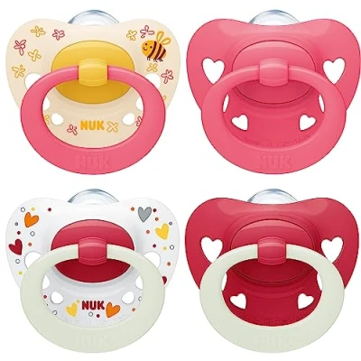 Abbildung von NUK Signature Day &amp; Night Babyschnuller 6 18 Monate Beruhigt 95 % der Babys BPA freie Silikonschnuller in Herzform Leuchtet im Dunkeln Herzen 4 Stück