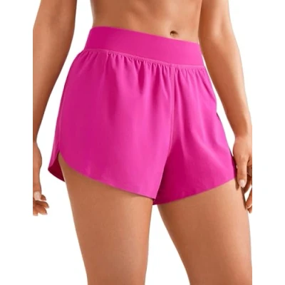 Abbildung von CRZ YOGA Damen Mid Waist Running Shorts Seitliche Splits Sport Workout Kurze Hose Leichte Atmungsaktive Sporthose Laufhose Hibiskus Purpur 40