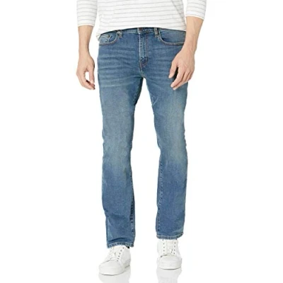 Abbildung von Amazon Essentials Herren Bootcut Jeans mit schmaler Passform, Mittelblau Vintage, 31W / 32L