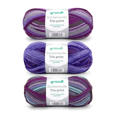 Abbildung von Gründl Sockenwolle Trio Strickset aus 3 x 100 g Sockengarn (75% Schurwolle (superwash), 25% Polyamid) + Anleitung, violett