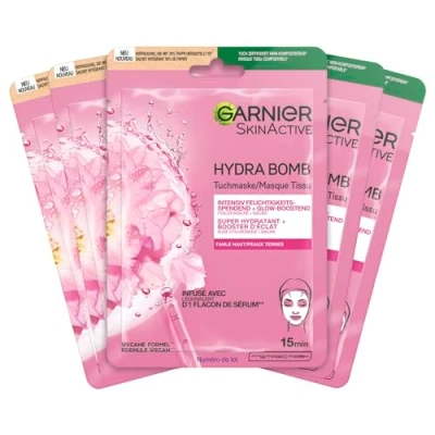 Abbildung von Garnier Tuchmaske, Gesichtsmaske für fahle Haut, Glow boostend und feuchtigkeitsspendend, Mit Hyaluronsäure Sakura, Hydra Bomb, 5x28g