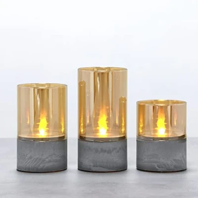Abbildung von Fanna 3er Set Gold flammenlose Flackernde Led Kerzen im Glas Industrieller Stil, Glaswindlichter mit Timerfunktion, warmweiße Licht H. 10cm, 12,5cm, 15cm