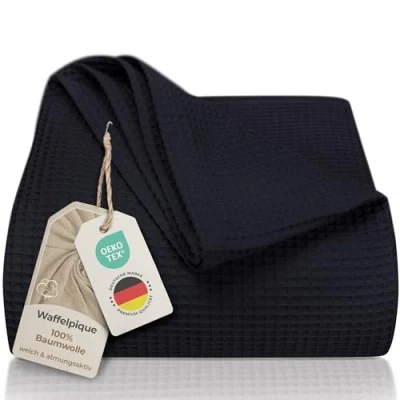 Abbildung von LAYNENBURG Premium Tagesdecke 180 x 220 cm Waffelpique 100% Baumwolle leichte Wohndecke Waffeloptik Baumwolldecke als Bett Überwurf, Sofa Couch Überwurf Decke (schwarz)