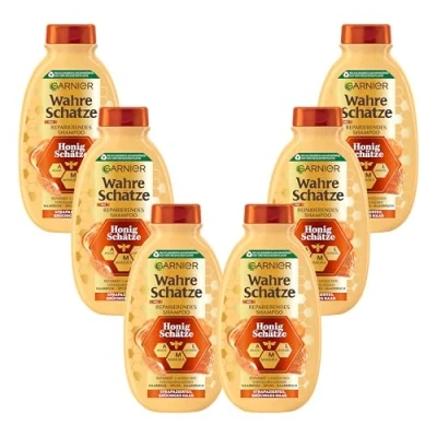 Abbildung von Garnier Shampoo gegen brüchiges Haar, Reparierendes Haarshampoo mit Akazienhonig und Bienenwachs, Für mehr Glanz Geschmeidigkeit, Wahre Schätze Honig, 6 x 250 ml