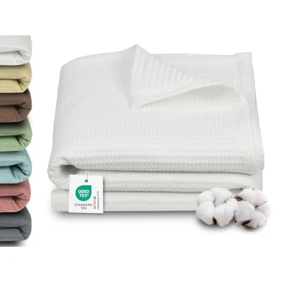 Abbildung von ZOLLNER Kuscheldecke in 150x200 cm 100% Baumwolle Zeitloses Waffelmuster knitterarme und atmungsaktive Couchdecke weiß waschbar bis 60C Hotelwäschequalität Oeko Tex® Zertifiziert