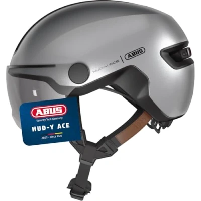 Abbildung von ABUS Stadthelm HUD Y ACE stylischer Fahrradhelm mit Visier und magnetischem, aufladbarem LED Rücklicht für Damen Herren Silber, Größe L