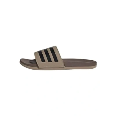 Abbildung von adidas Unisex Adilette Comfort Slides, Blanch Cargo/core Black/Earth strata, 44 2/3 EU