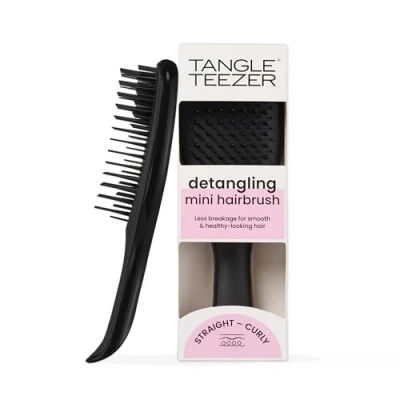 Abbildung von Tangle Teezer Mini The Ultimate Detangler Haarbürste, sanft zu nassem Haar, zweistufige Zähne und bequemer Griff, ideal für Kinder Reisen, reduziert Knoten Haarbruch, Schwarz