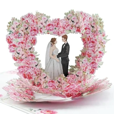 Abbildung von Favour Pop Up® NEU Hochzeitskarte 3D Brautpaar in einem Herz aus Rosen Geldgeschenk für Flitterwochen Glückwunschkarte Hochzeit Ausgefallene Up