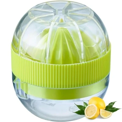 Abbildung von Westmark Kleine Zitruspresse mit Behälter und Deckel, Durchmesser: 7,2 cm, Fassungsvermögen: 50 ml, Kunststoff, Fresh and Fruity, Transparent/Grün, 30932280