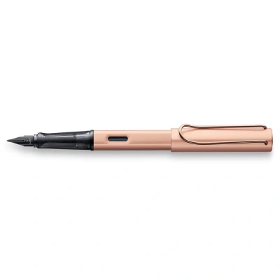 Abbildung von LAMY Lx edler Füllhalter 076 aus leichtem Aluminium in der Farbe roségold mit Edelmetallveredelung und schwarz glänzender PVD Stahlfeder, inkl. Tintenpatrone T 10 blau Geschenkverpackung