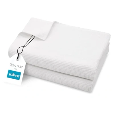 Abbildung von ZOLLNER 2er Set Saunatücher in 70x180 cm langlebige Badetücher weiß mit praktischem Aufhänger Zeitloses Waffelmuster waschbar bis 95C Baumwolle Hotelqualität