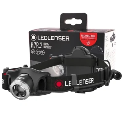 Abbildung von Ledlenser H7R.2 Stirnlampe LED, aufladbar mit Lithium Akku, auch 4xAAA Batterien nutzbar, fokussierbar, 300 Lumen, stufenlos dimmbar, Leuchtweite 160m, rotes Rücklicht, USB Ladekabel, schwenkbar