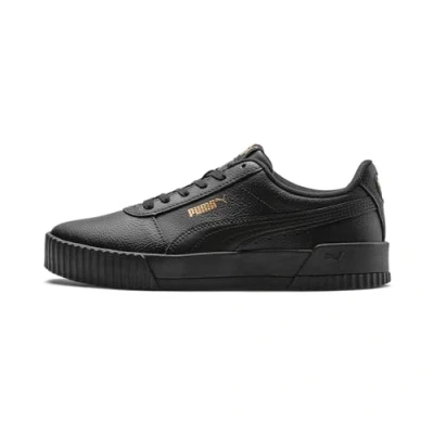 Abbildung von Puma Carina Sneaker low, Damen, Größe: 40, Black/team gold Leder und lederimitat