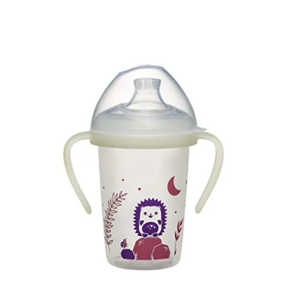 Abbildung von NIP Trinklernflasche Day&amp;Night: auslaufsicherer Trinkbecher mit Griff &amp; weichem Trinkschnabel, leuchtet im Dunkeln, ab 6 Monaten, 270 ml, BPA frei, Igel