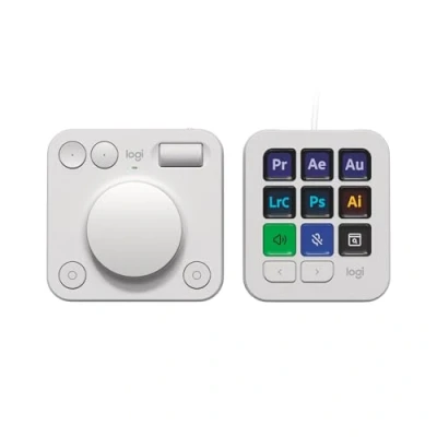 Abbildung von Logitech MX Creative Console, Programmierbares Tastenfeld mit 9 anpassbaren LCD Tasten und Regler für Grafikdesign, Videobearbeitung, Fotografie, Verwendung Adobe, Zoom, Spotify mehr Hellgrau