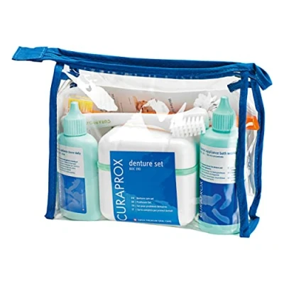 Abbildung von Curaprox Zahnprothesen Reinigungs Set BDC, mit Pflege Gel Daily, Weekly Reiniger, Reinigungsbürste und Reinigungsbox für Prothesen