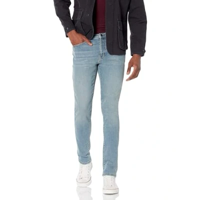Abbildung von Amazon Essentials Herren Stretchjeans, Skinny Passform, Hellblau Vintage, 31W / 30L