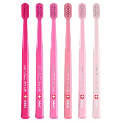 Abbildung von Curaprox Pink Edition, Box mit sechs Zahnbürsten CS 5460, verschiedene Pinktöne, vom Verkaufspreis gehen 10 Euro an Ribbon Deutschland