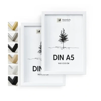 Abbildung von Heimlich® Bilderrahmen A5 14,8x21 cm, Ayous Holz, Weiß, 2er Pack Diplom Poster Collage Rahmen mit Folienabdeckung Wandmontage oder Tischaufsteller