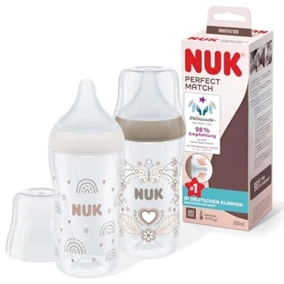 Abbildung von NUK Perfect Match Babyflaschenset Ab 3 Monate Passt sich dem Baby an Temperature Control Anti Colic 260 ml BPA frei Silikontrinksauger, Medium Regenbogen und Herz 2 Stück