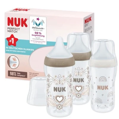 Abbildung von NUK Perfect Match Babyflaschenset Ab 3 Monate Passt sich dem Baby an Temperature Control Anti Colic 260 ml BPA frei Silikontrinksauger, Medium Regenbogen und Herz Stück