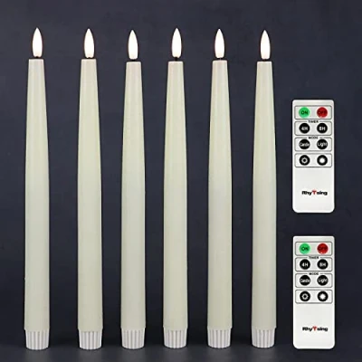Abbildung von Rhytsing 6 flammenlose LED Stabkerzen Tafelkerzen Natürliche Wachsfarbe mit Timer Funktion, Höhe je 29cm, Leuchterkerzen warmweißes Licht, 2 Fernbedienung enthalten