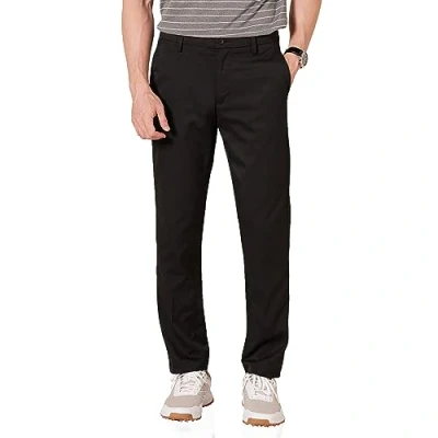 Abbildung von Amazon Essentials Herren Golf Stretchhose, Schmale Passform, Schwarz, 33W / 32L