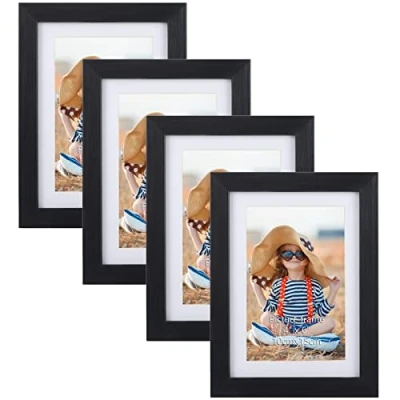 Abbildung von EXYGLO 4er Set Bilderrahmen 10x15 cm mit Passepartout oder 13x18 ohne Passepartout, Klassischer Fotorahmen Schwarz Holzmaserungsrahmen, Wand Tischaufsteller
